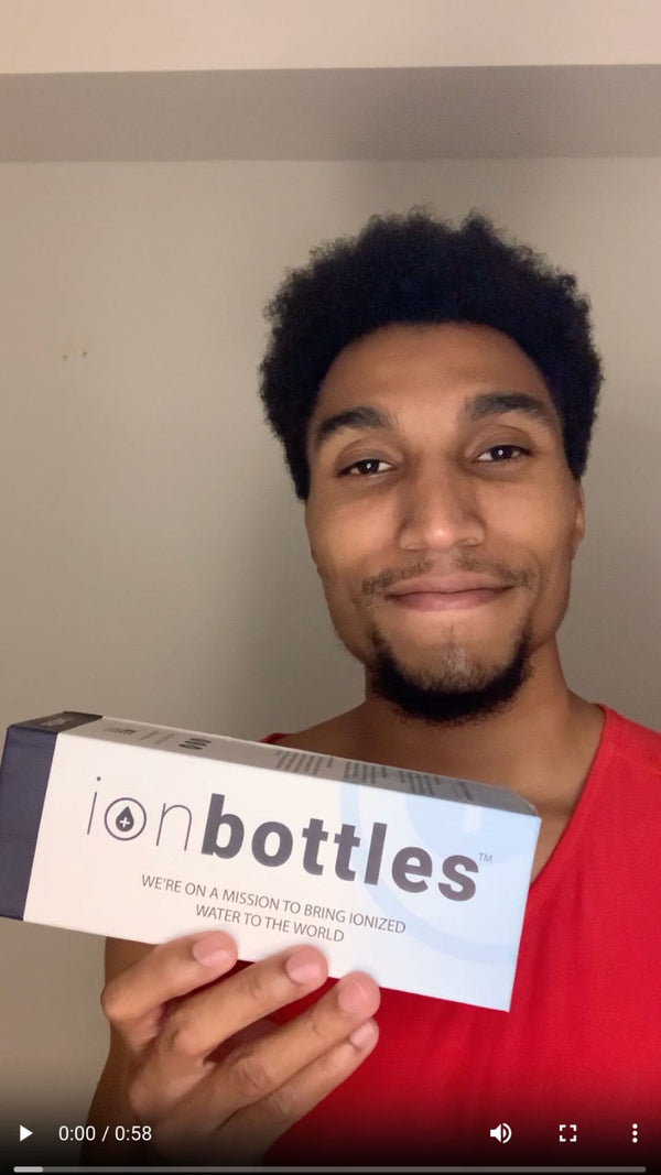 Customer holding the ionbottles package